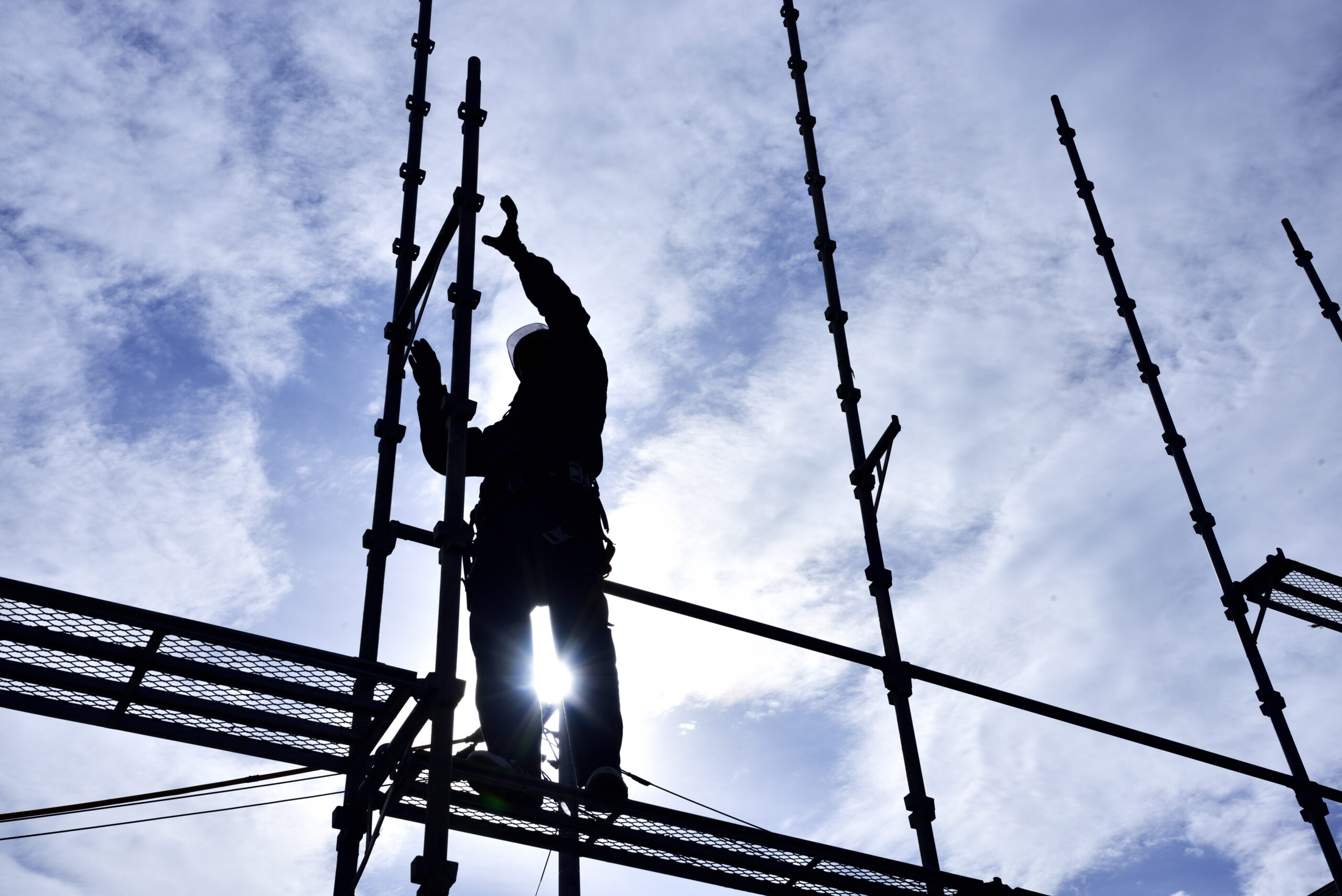 The,Builder,"steeplejack",Assembling,The,Scaffold,At,The,Housing,Construction